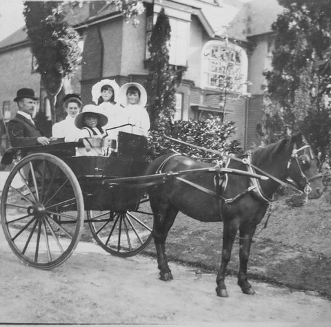 Here’s a picture of Colin Lovatt (smallest one in the front with huge hat) from about 1917 when he would have been about 4. Outside the family home in Derbyshire with his two sisters, Nanny and Groom in pony and trap. By 1928 the family fortunes were in decline so it made sense for him to emigrate seeking a new life.