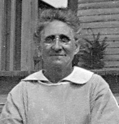 Image of Ellen Mary Bartholomew taken seated on a step in Montreal, Quebec, Canada